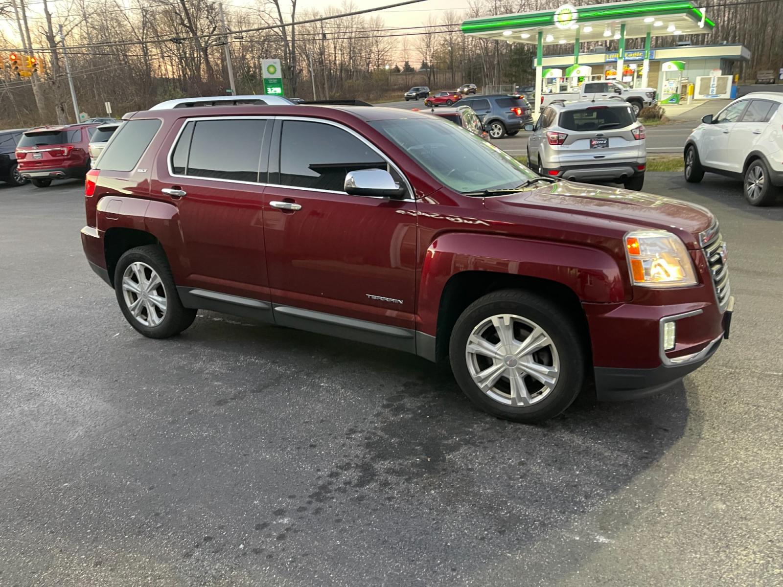 2016 Red /Black GMC Terrain SLT AWD (2GKFLUEK3G6) with an 2.4L I4 DOHC 16V engine, 6A transmission, located at 11115 Chardon Rd. , Chardon, OH, 44024, (440) 214-9705, 41.580246, -81.241943 - This 2016 GMC Terrain SLT AWD is a stylish and versatile SUV that offers a comfortable driving experience and plenty of features. With all-wheel drive, this vehicle is perfect for those who live in areas with harsh weather conditions. The 2.4-liter engine provides sufficient power and good fuel effi - Photo #3